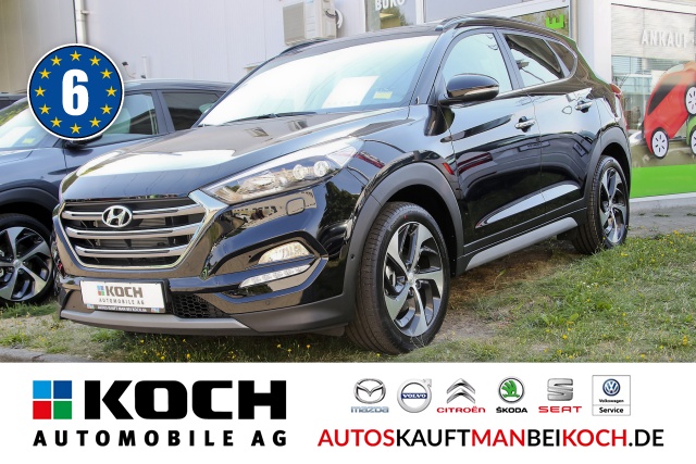Tucson 1.6 Premium 4WD Autom. Leder Navi Panod. / Foto 1