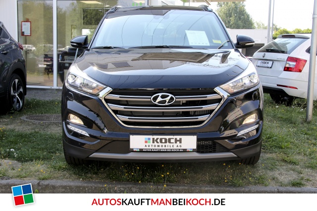 Tucson 1.6 Premium 4WD Autom. Leder Navi Panod. / Foto 2