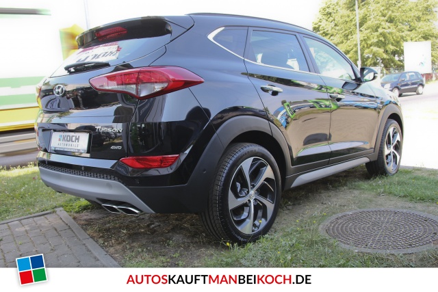 Tucson 1.6 Premium 4WD Autom. Leder Navi Panod. / Foto 3