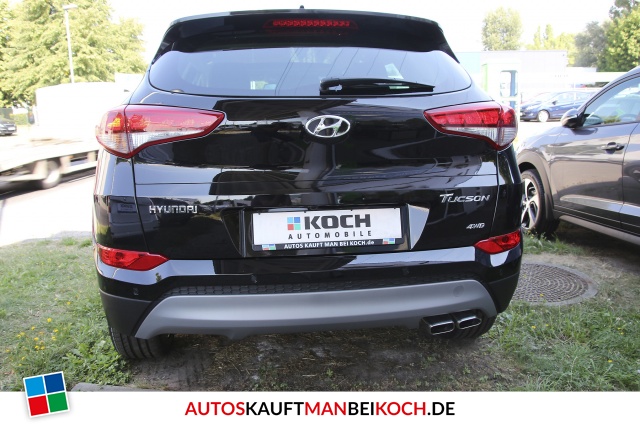 Tucson 1.6 Premium 4WD Autom. Leder Navi Panod. / Foto 4