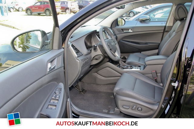 Tucson 1.6 Premium 4WD Autom. Leder Navi Panod. / Foto 6