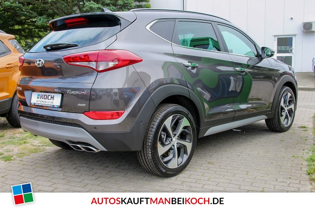 Tucson 1.6 Premium 4WD Autom. Leder Navi Panod. / Foto 3