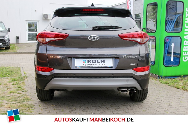 Tucson 1.6 Premium 4WD Autom. Leder Navi Panod. / Foto 4