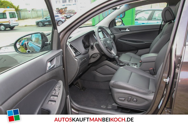 Tucson 1.6 Premium 4WD Autom. Leder Navi Panod. / Foto 6