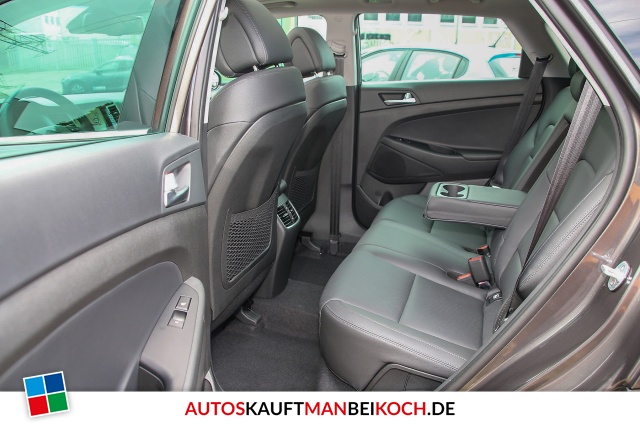 Tucson 1.6 Premium 4WD Autom. Leder Navi Panod. / Foto 7